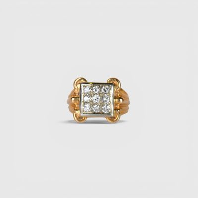 an image of a gold ring with a princess cut diamond