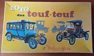une boîte sur laquelle sont représentés une voiture et un train