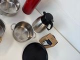 many pots and pans that are on the counter
