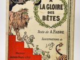 an old book with a picture of a lion and a tiger on it