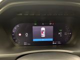 an image of a car dashboard with a digital display