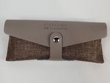 a close up of a brown case with a metal clasp