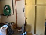 a room that has a bunch of boxes and boxes on the floor