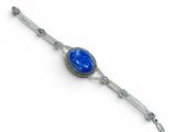 a close up of a bracelet with a blue stone on it