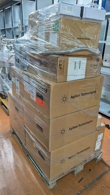 many boxes stacked on top of each other on a pallet
