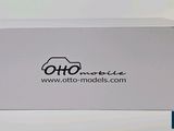 a white box with a black logo on it