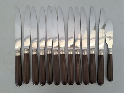 six knives and six knives with wooden handles