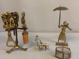 a few figurines that are sitting on a table