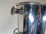 someone is taking a picture of a stainless steel ice bucket