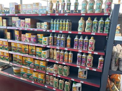 many different types of products on the shelves in the store