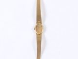 an image of a close up of a wrist watch on a white surface