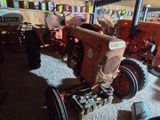 a tractor that is parked in a garage