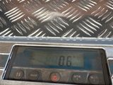 an image of a digital clock on the back of a truck