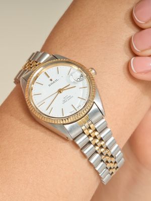 BREIL Montre de ville en acier plaqué or et or 18k 750