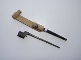 two tools that are laying on a table