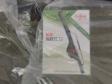a package of scissors sitting on top of a plastic bag
