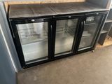 two glass doors on the back of a refrigerator