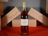 a bottle of wine that is sitting on a table