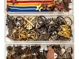 a clear box filled with lots of assorted items