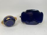 a blue and gold ring and a blue and white ring