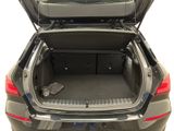 the back of a car with the trunk open and the luggage in the trunk
