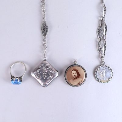 three different types of jewelry are displayed on a white surface
