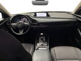 the interior of a car with a steering wheel, dashboard, and dash board