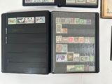 a lot of different stamps on the pages of a book
