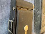 three suitcases that are on the wall next to each other