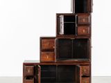 an image of a set of five wooden drawers and a cabinet