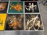 four different pictures of different paintings on a table