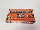 a close up of a box of cigarettes on a white surface
