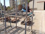 a picture of a building being built with a lot of wood