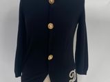 navy blue jacket with gold buttons on a mannequin base
