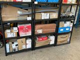 many boxes and boxes on the shelves in the garage