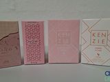 un lot de trois boîtes ornées de motifs différents