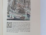 an open book with a picture of a boat on it