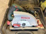 two tools in a tool box on the floor of a house
