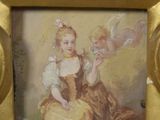 a picture of a painting of a woman holding a cupid