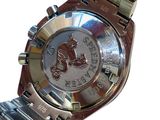 a close up of a watch on a white background