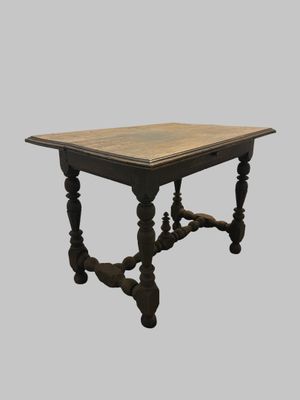 an image of a table with a wooden top on a gray background