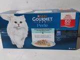a box of gourmet cat food sitting on a table
