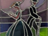 a stained glass picture of a man and a woman