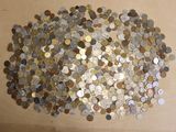a lot of coins that are on the table