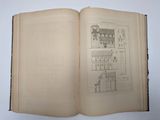 an open book with a drawing of a building on it