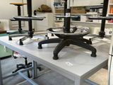 a table with a bunch of stools on it