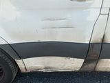 une photo d'une voiture qui a été gravement endommagée