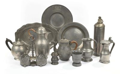 a lot of silver items that are sitting on a table