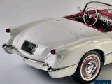 an image of a white car with a red interior