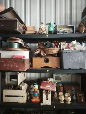 a shelf with many different items on top of it